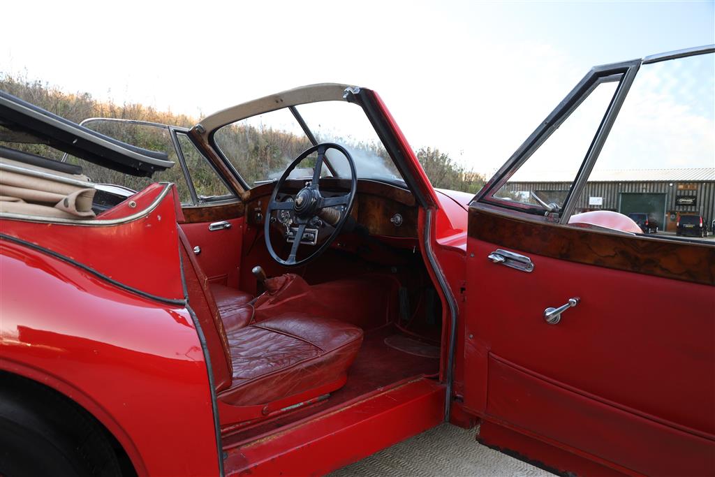 A 1955 Jaguar XK140 DHC